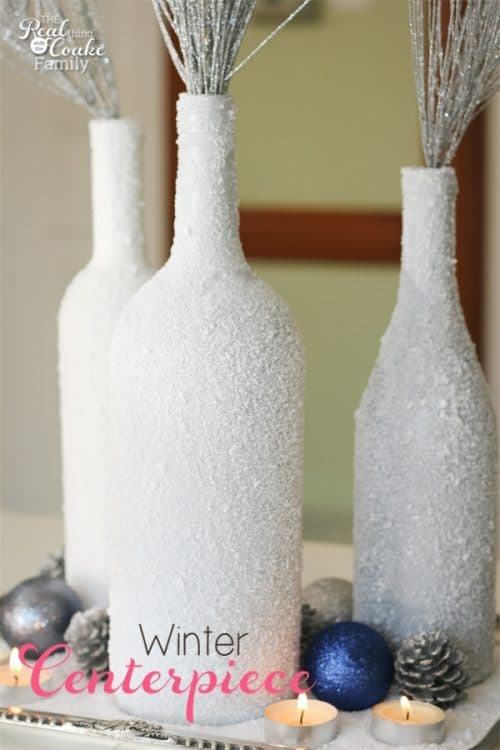 Gorgeous DIY winter Centerpiece made from wine bottles and epsom salt. This will be perfect in my home decor!