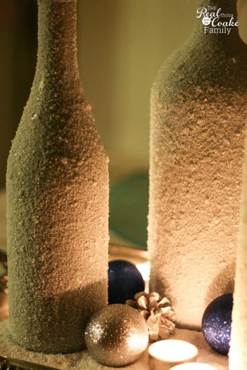 Gorgeous DIY winter Centerpiece made from wine bottles and epsom salt. This will be perfect in my home decor!