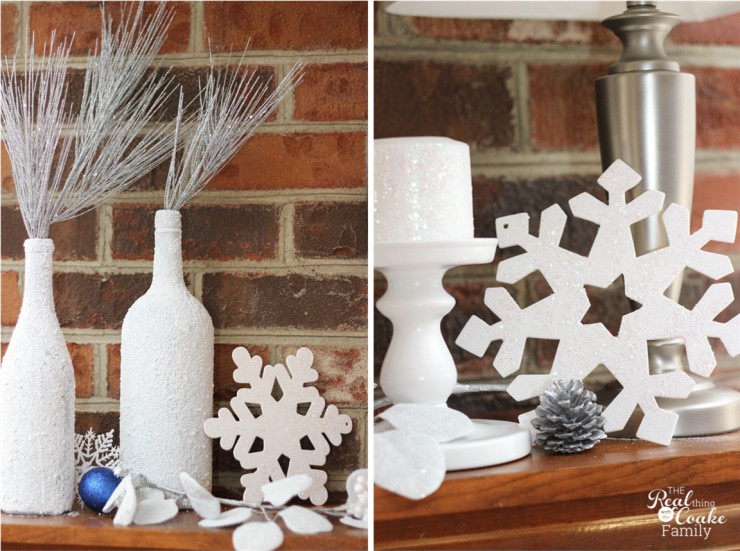 Pretty winter mantel decor using glitter snowflakes, wine bottles, candles and hurricane lamps. #Winter #Mantel #HomeDecor