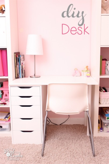 DIY Desk to fit into a IKEA Expedit custom built shelving unit. Perfect idea for a child's room, entertainment center, or home office. #DIY #desk #IKEA #RealCoake