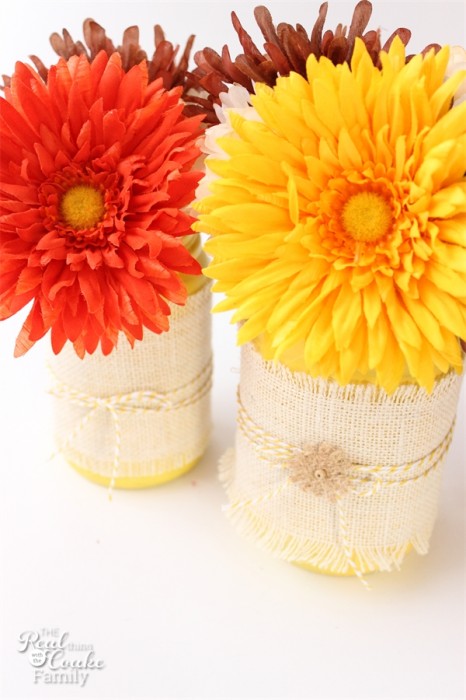 I love these fall mason jars (and any mason jar crafts)! They were a total craft fail that  were turned around with some burlap, twine and flowers. You have to see the difference!