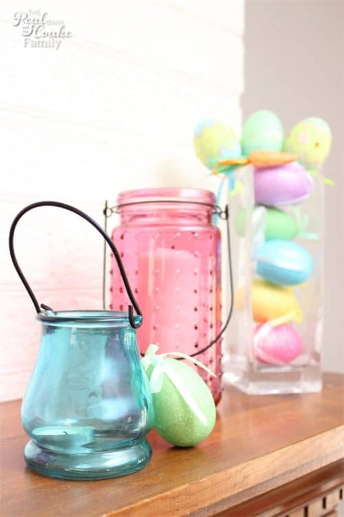 Such cute Easter Decorations for the mantel. I love the colors and the fun crafts to make this mantel. Need to add these to my Easter Ideas. 