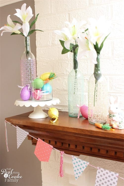 Such cute Easter Decorations for the mantel. I love the colors and the fun crafts to make this mantel. Need to add these to my Easter Ideas. 