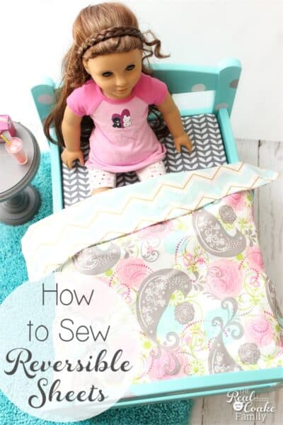 I love simple and cute sewing projects like this. Easy enough to do as a summer activity with the kids, make reversible sheets for our American Girl Doll beds.
