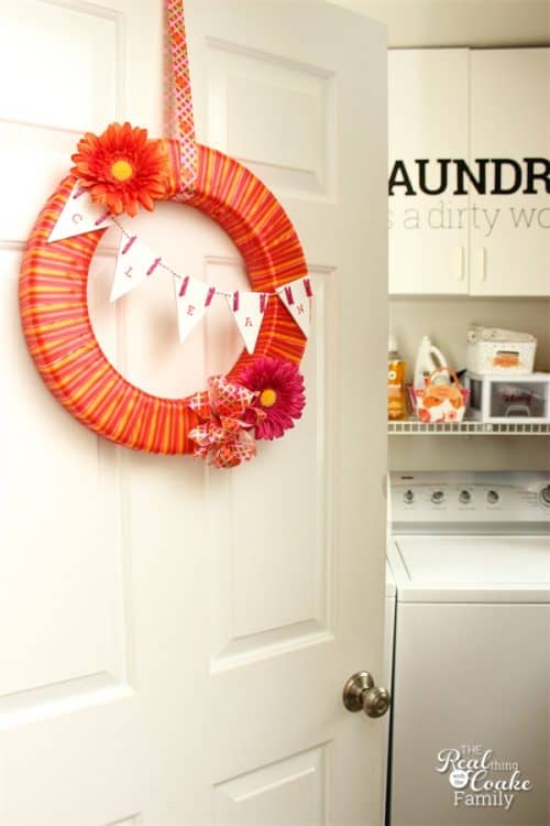 This is such cute laundry room wreath! It would brighten up my laundry room door. Looks like an easy DIY. Need to make this one. 