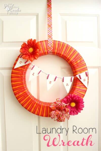 This is such cute laundry room wreath! It would brighten up my laundry room door. Looks like an easy DIY. Need to make this one.