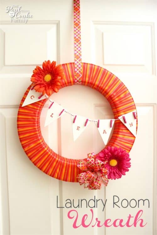This is such cute laundry room wreath! It would brighten up my laundry room door. Looks like an easy DIY. Need to make this one. 