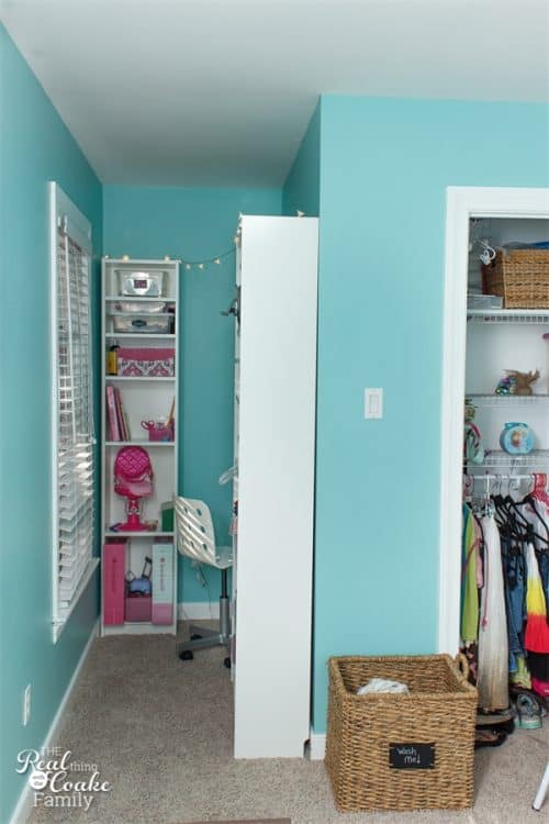 Love how organized these IKEA bookcases are. They make great a great way to organize and provide storage in this awkward kids room corner. 