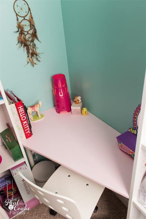 This corner desk is a genius use of a small space. It is a DIY desk that involves an IKEA Hack. Fun!