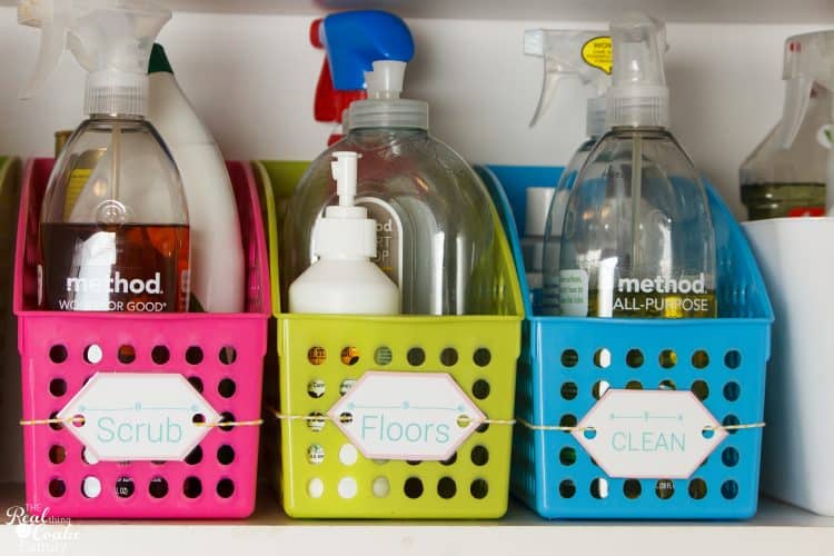 LOVE this easy way to have organized cleaning supplies. Using office supplies to organize is a genius idea. 