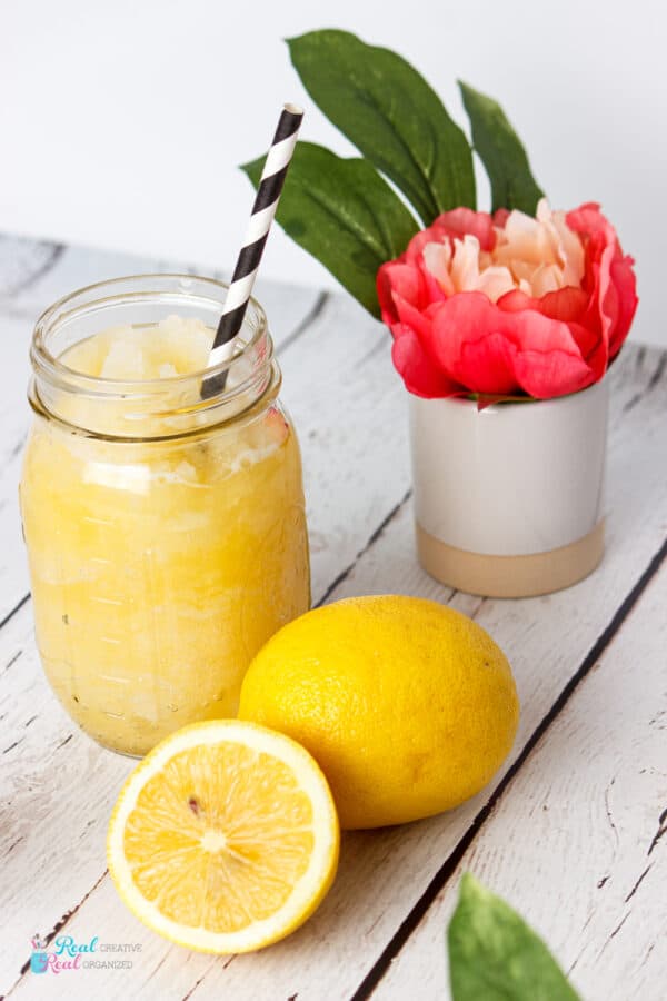 lemons cut and slushy in a jar