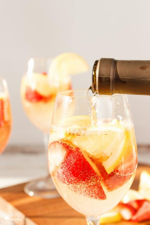 It is so fun to find new, yummy drink recipes! This Strawberry Lemon Sangria is actually a cross between a Mimosa and a Sangria and is perfect for Easter, brunch or any day. 