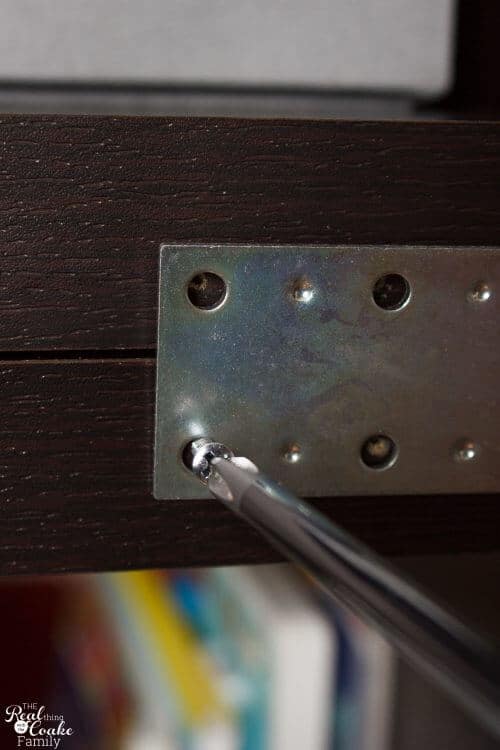screwing screws into mending braces