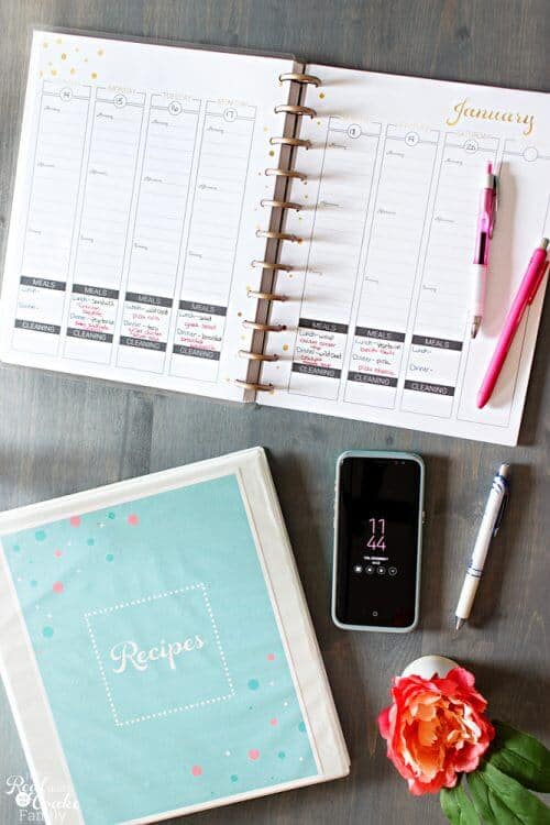 picture of planner open planning meals with recipe binder