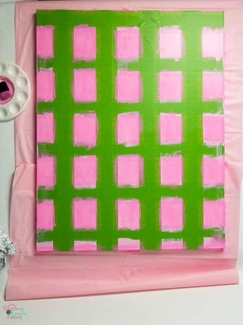 Step by step tutorial on how to paint gingham and make the cutest wall art out of a craft store canvas. Perfect craft project to make DIY wall art.