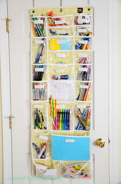 school supplies organized in over door shoe holder