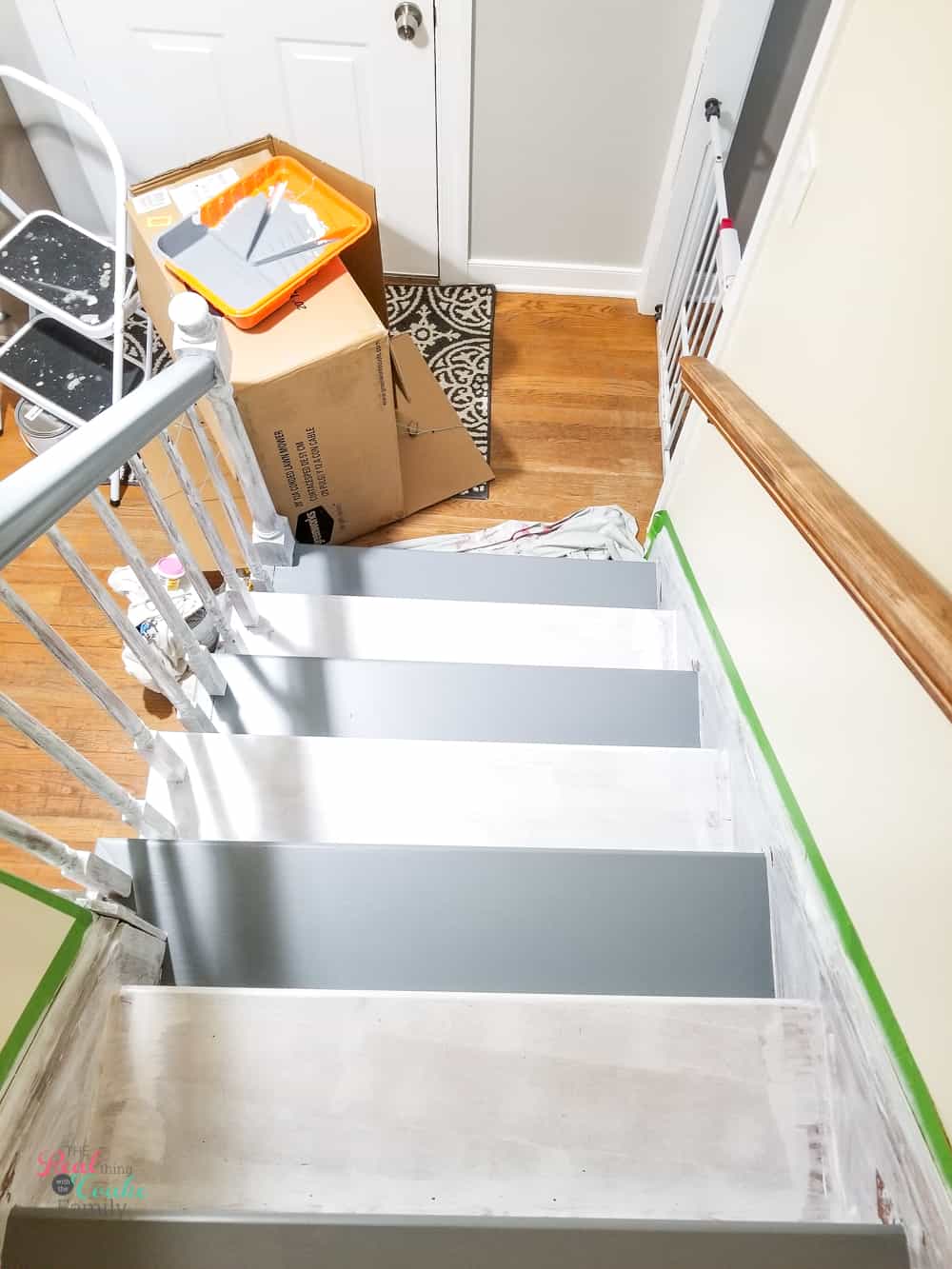 showing blocking off stairs for pets with every other tread painted
