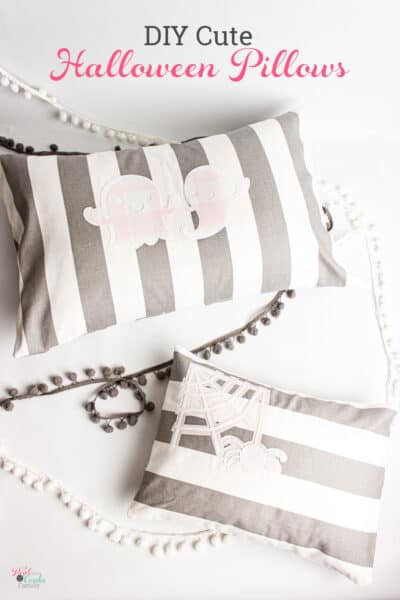 grey, white and pink halloween pillows