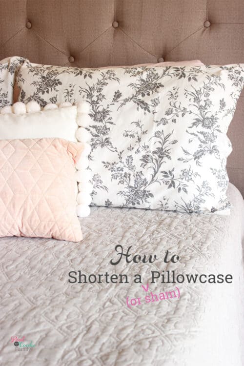 shortened pillow sham on bed with decorative pillows