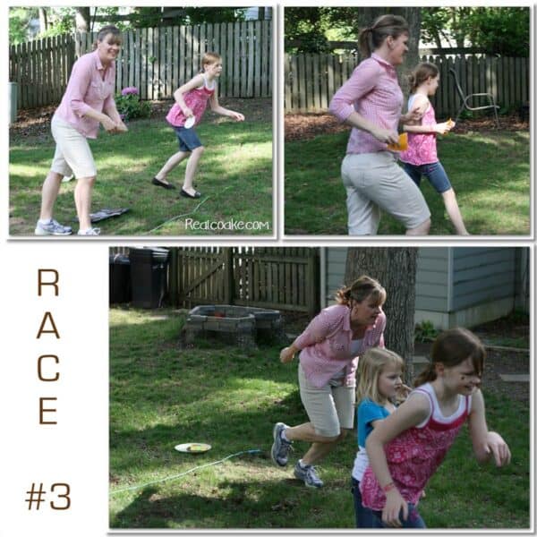 Mom and daughters racing in an active family game